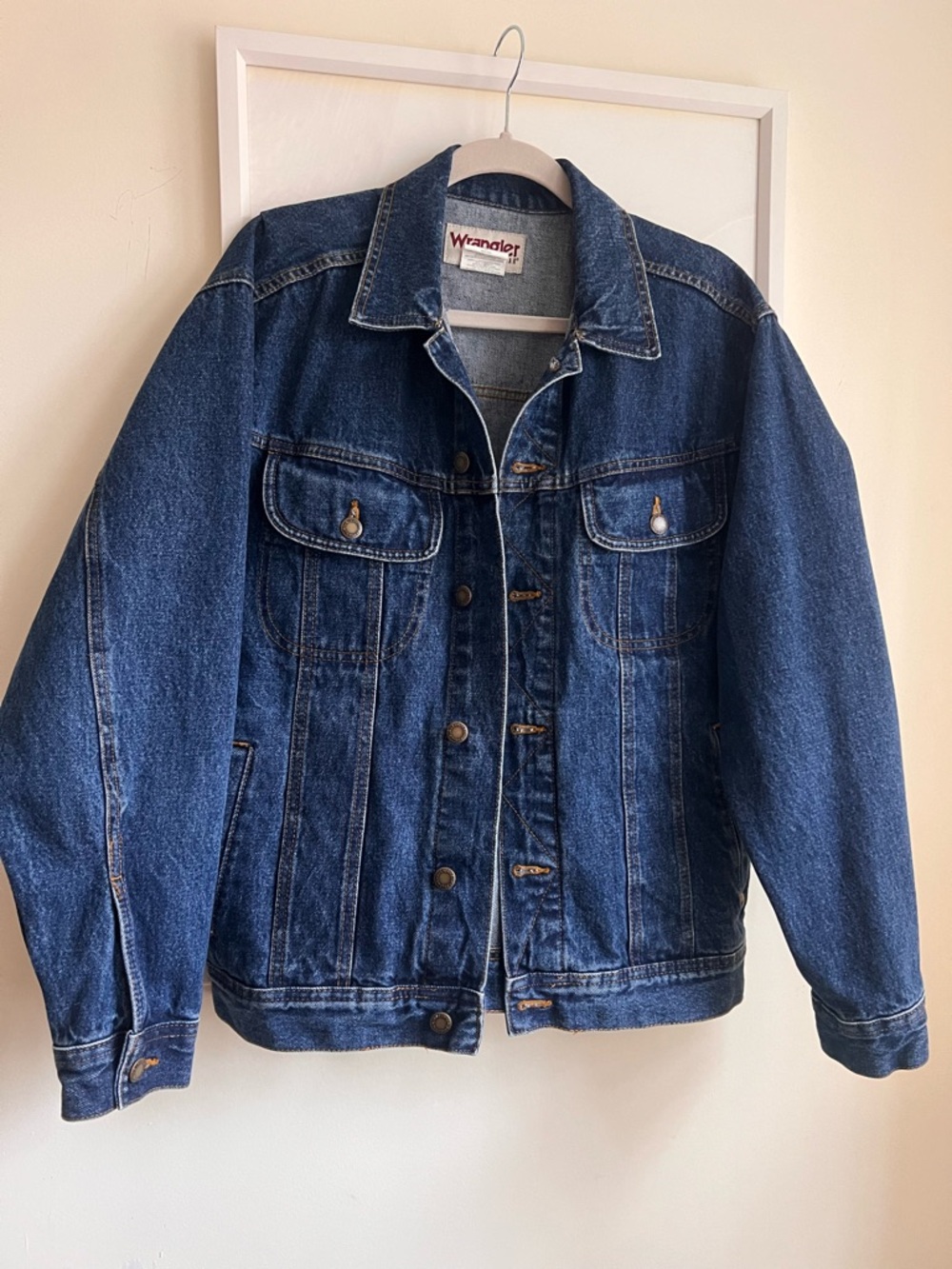 Classic Wrangler denim jacket in a rich dark wash with Maroon Logo